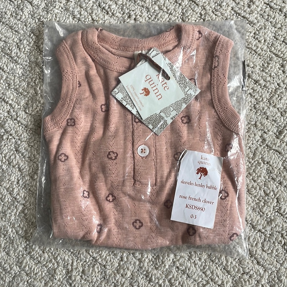 Kate Quinn sleeveless Henley bubble
